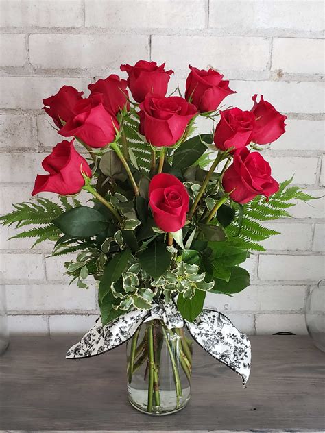 12 beautiful long stemmed red roses in Byron Center, MI | Tandem Studio