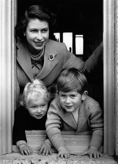 1952: Queen Elizabeth yanks young Prince Charles through a ...