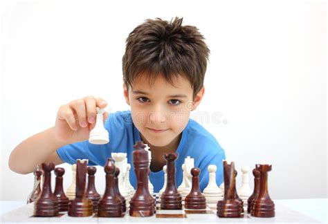 A boy playing chess stock photo. Image of chess, child ...