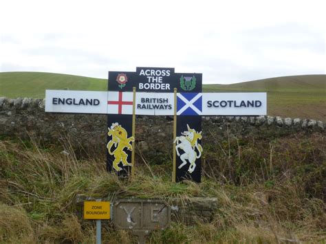 A sign marking the border between Scotland and England ...