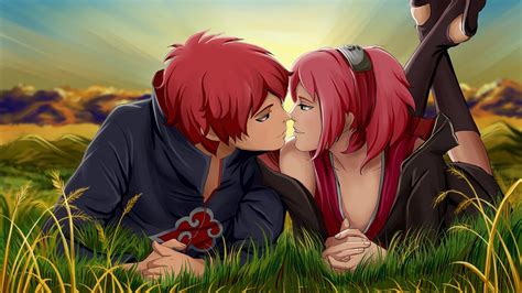 An anime couple with red hair kissing in the grass ...