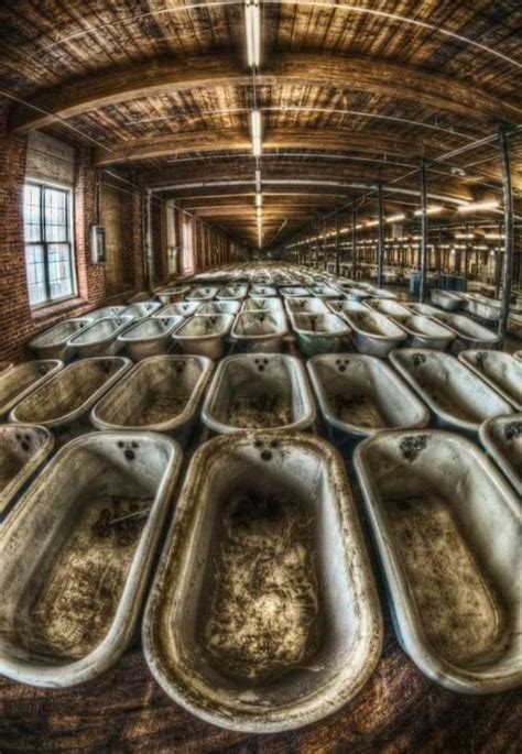 Baths left in an abandoned bath factory. : AbandonedPorn