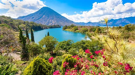 Bay of Lake Atitlán with view to Volcano San Pedro in ...
