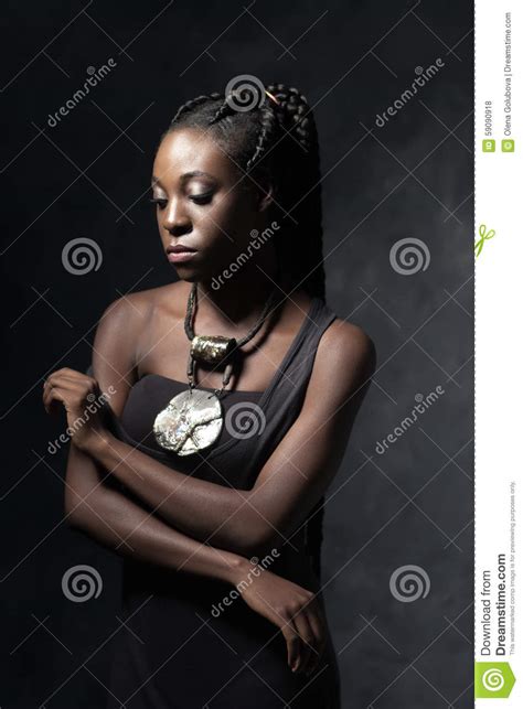 Beautiful Thoughtful Black Woman With An Ethnic Necklace ...