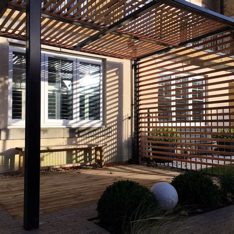 Bespoke steel framed pergola with slatted cedar | Pergola, Cedar ...