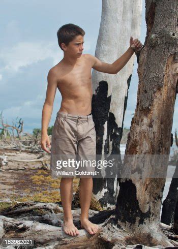 Boy Exploring Island On Deserted Beach Stock Foto   Getty Images
