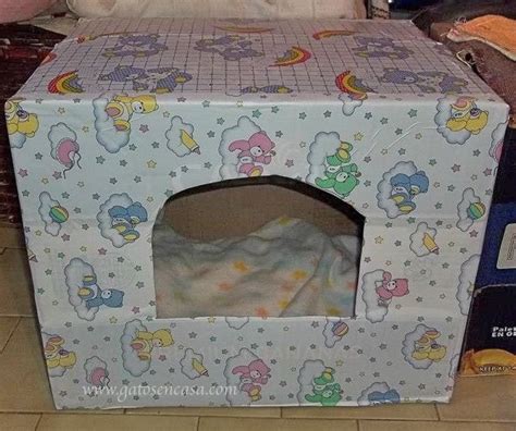 Cajas de cartón convertidas en una casita para tu gato ...