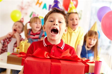 Child celebrating his birthday Photo | Free Download