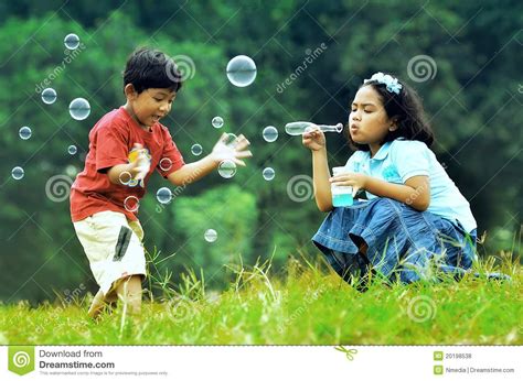 Children Playing With Soap Bubbles Stock Photo   Image of ...