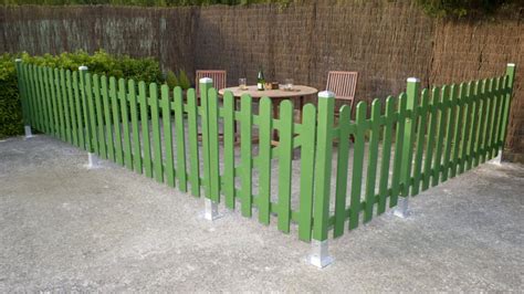 Cómo construir un cercado de madera para el jardín ...