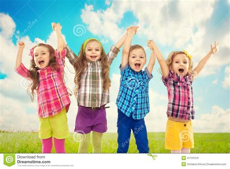 Cute Happy Kids Are Jumping Together Stock Photo   Image ...