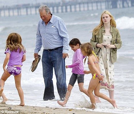 Dakota Fanning and sister Elle have a blast at LA beach ...