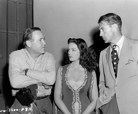 Director Henry Hathaway with Gene Tierney and visitor Gary ...