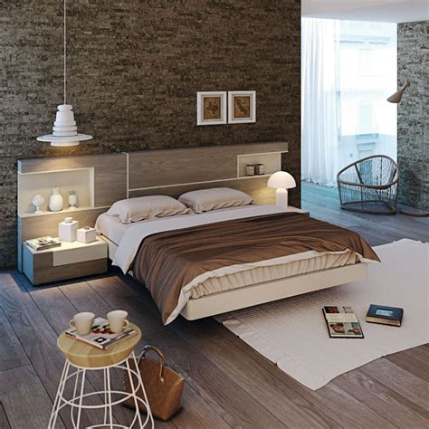 Dormitorio de matrimonio moderno con pared de piedra ...