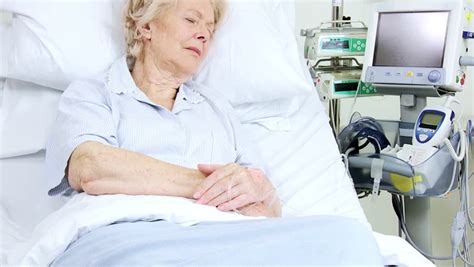 Elderly Female Caucasian Lady Sleeping In A Hospital Bed ...