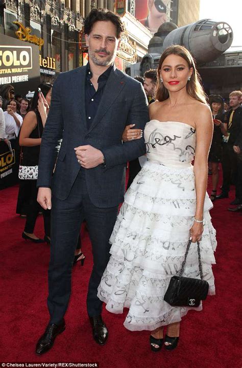 Emilia Clarke enchants in ruby red gown with Alden ...