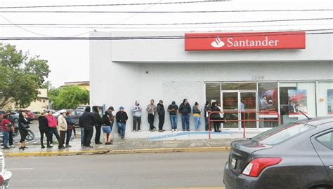 Enormes filas en banco Santander [Piedras Negras]   22/03/2020 ...
