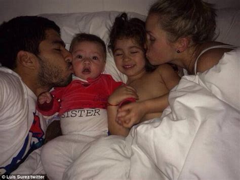 Family matters: Suarez relaxes with his wife and children ...