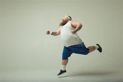 Fat Man Jogging Stock Images   Download 327 Royalty Free ...