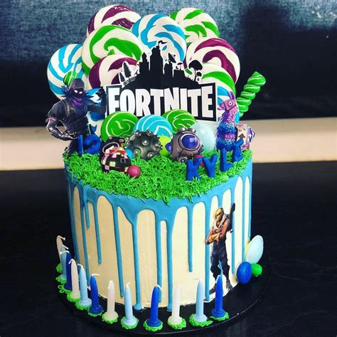 Fortnite drip cake with lollipops | Birthday party cake ...