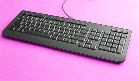 Free Stock Photo 12712 Black computer keyboard on pink ...