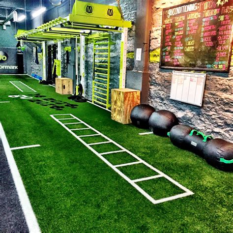 Functional fitness training gym design. Open space for movement, wall ...