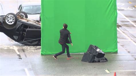 Grant Gustin as Barry Allen films a scene for The Flash ...