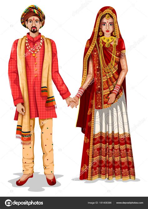 Gujaratii bruidspaar in traditionele klederdracht van ...