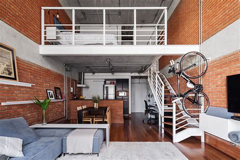 Loft estilo industrial com sala, cozinha e quarto ...