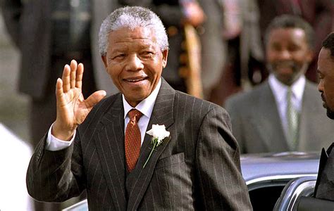 Mandela heads into parliament in Cape Town on May 9, 1994 ...