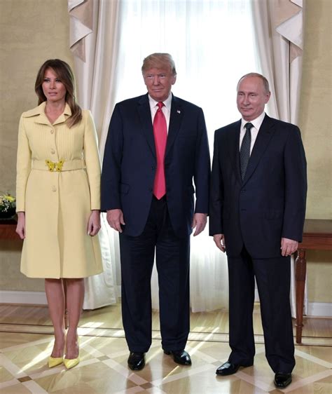 Melania Trump Wears Yellow Gucci Coat to Meet Putin in ...