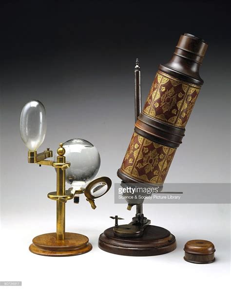 Microscope associated with Robert Hooke , shown with a ...