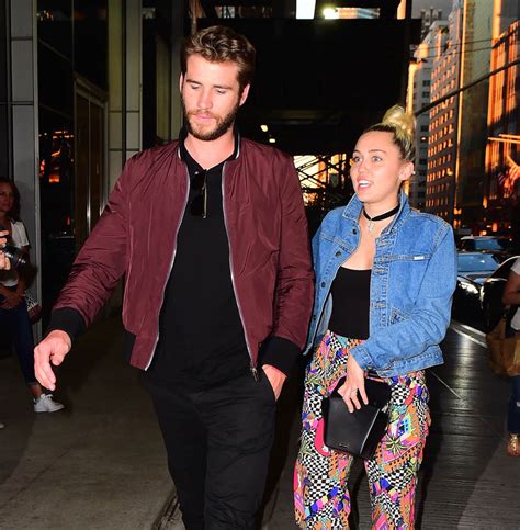 Miley Cyrus and Liam Hemsworth hold hands in New York ...