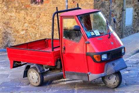 MONTALCINO, ITALY MAY 14: Red Piaggio Ape 50 in the street on – Stock ...