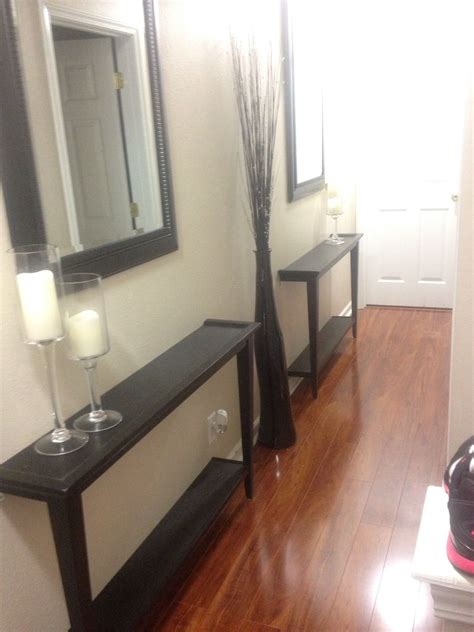 Narrow hallway decor solution! Cut a table in half and ...