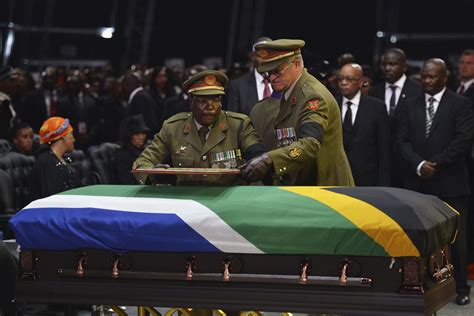 Nelson Mandela laid to rest as South Africa says goodbye ...