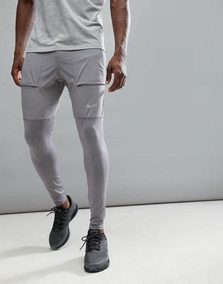 Nike Running hybrid joggers in grey aa4199 036 | ASOS