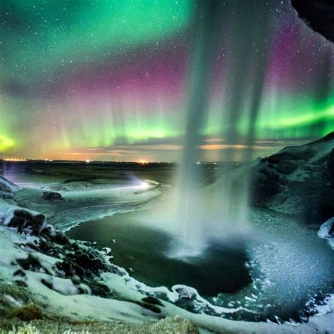 Northern Lights behind Seljalandsfoss Iceland last night ...