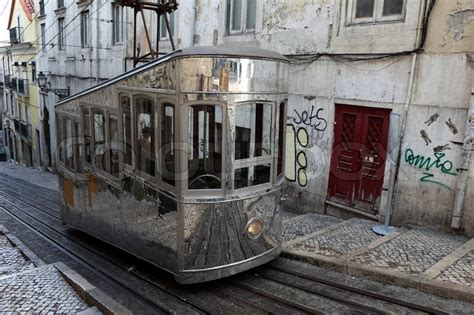 Old cable car in the street of Lisbon, ... | Stock image ...