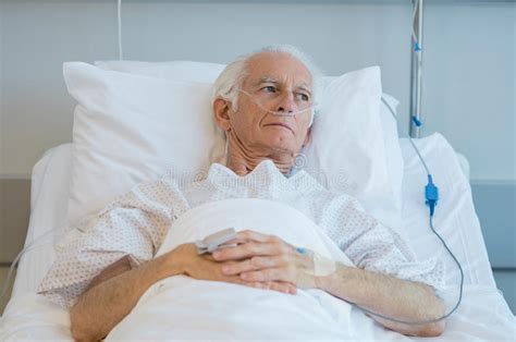 Old patient lying on bed stock photo. Image of depression ...
