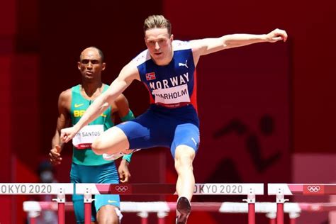 Olympics: Karsten Warholm wins men s 400m hurdles in world record time ...