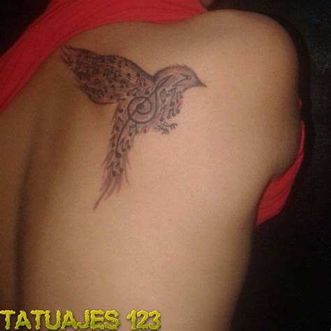 Pájaro con notas musicales   Tatuajes 123