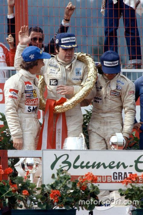 Podium: race winner Alan Jones, Williams, second place Gilles ...