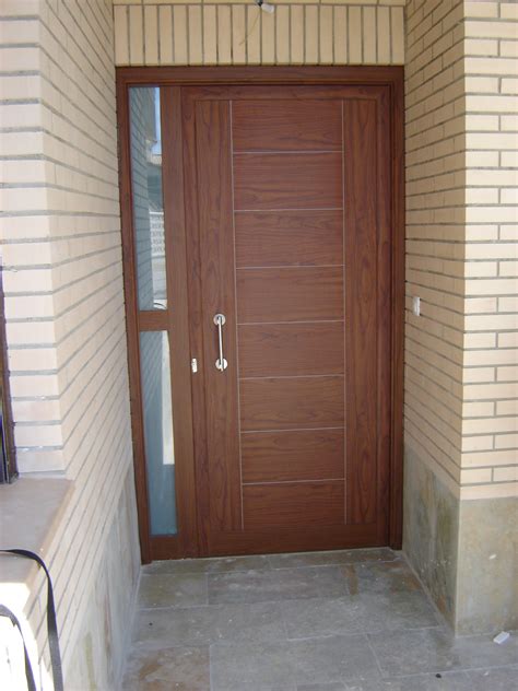 puerta entrada con fijo | Talusa | Carpintería de Aluminio y PVC