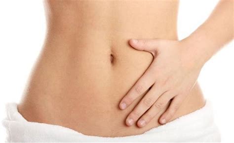 ¿Qué causa el dolor abdominal más bajo y qué puede hacer?   Remedios ...