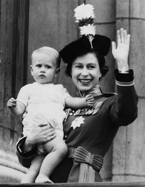 Queen Elizabeth II holding Prince Edward on Buckingham ...