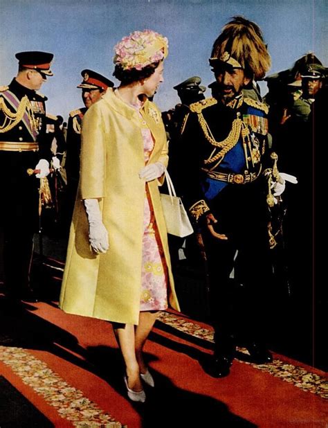 Queen Elizabeth walking on a red carpet in Addis Ababa ...