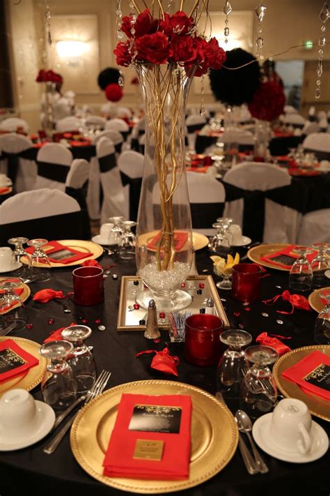 Red, black and gold table decorations for 50th birthday ...