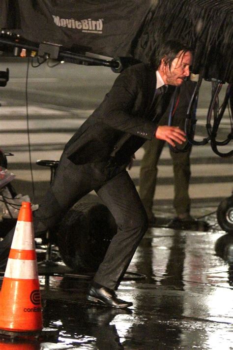 Riveting Reeves — Keanu Reeves pictured running under the ...
