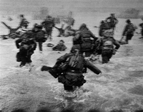 Robert Capa capturing the D Day landing at Normandy | Most influential ...